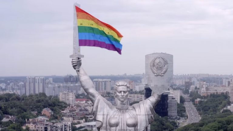 statue kiev rainbow flag