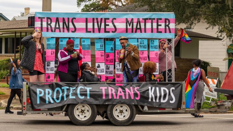 char "Trans Lives Matter"